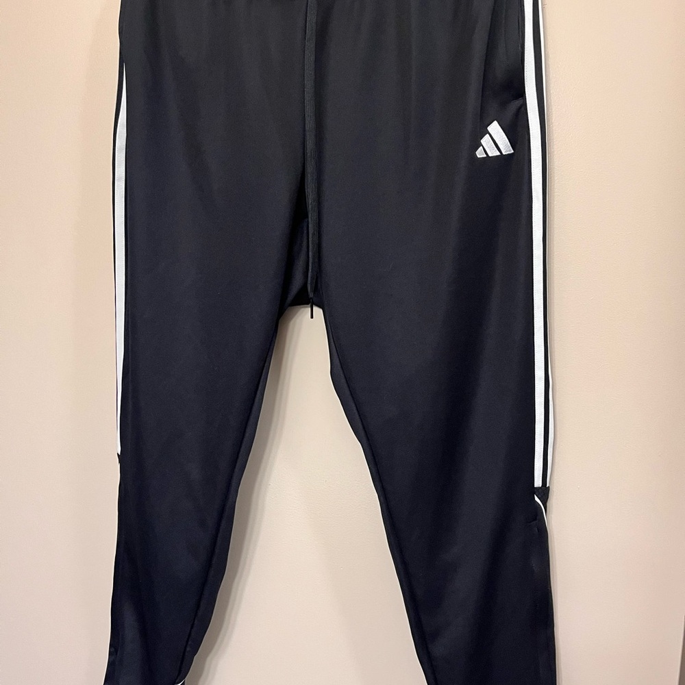 Adidas Black and White Sweatpants with Iconic Stripes